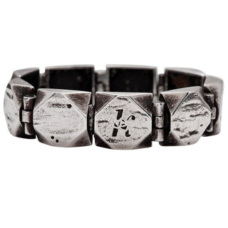 Karen Karch Silver Outshine 16mm wide bracelet with geometric square faceted corner links on a white background.