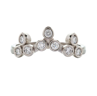 Karen Karch Turned Out Belgian Tiara Curved Ring in platinum with 10 brilliant cut colorless diamonds in a crown like formation on a white background.