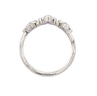 Karen Karch Turned Out Belgian Tiara Curved Ring in platinu mwith 10 brilliant cut colorless diamonds in a crown like formation, top view, on a white background.