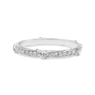 Karen Karch Platinum Colorless Diamond-Studded Eterity Band on White Background.