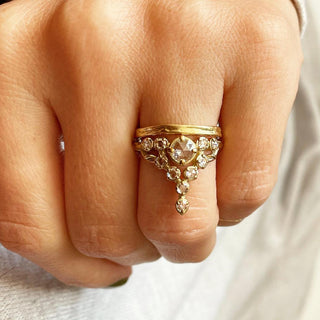 Karen Karch Everlasting weathered 18k Yellow Gold Band on hand stacked with Rose Cut Diamond Floating Star Ring. 