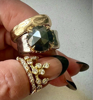 KAREN_KARCH_18ky_Studded_Vine_Half_held on thumb with Belgian Tiara Ring.