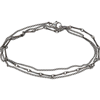 Karen Karch by Deme Wolfe Mystical Bling Silver chain featuring two different chain styles merged and wrapped 3 times as a bracelet on white background