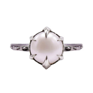 Karen Karch by Deme Wolfe white Pearl 925 sterling silver Solitaire Ring with Sharp claws on white background. 