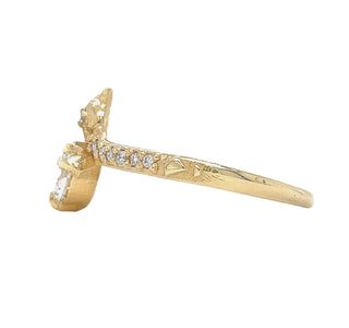 Karen Karch by Deme Wolfe Studded Snake Solitaire in 14k yellow gold an offset Lab Diamond, full side view, on white background.
