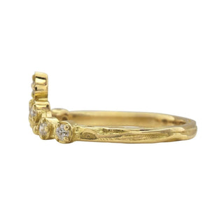 A Karen Karch Turned Out Grace Tiara Ring in 18k yellow gold featuring claw-set brilliant-cut diamonds, side view, on white background.