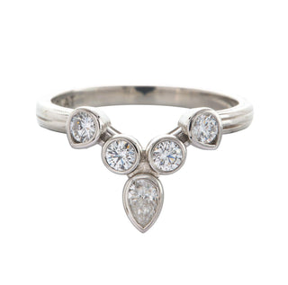 Karen Karch Turned out Invincible tiara Ring in Platinum and Diamonds on white backround.