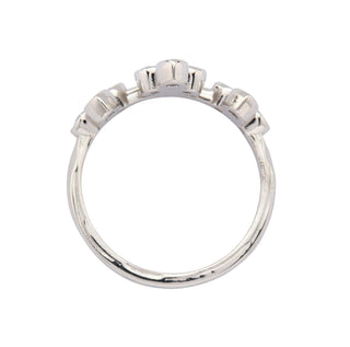 Karen Karch Turned Out Belgian Tiara Ring in Platinum with 10 diamonds in a crown like formation top view on a white background.