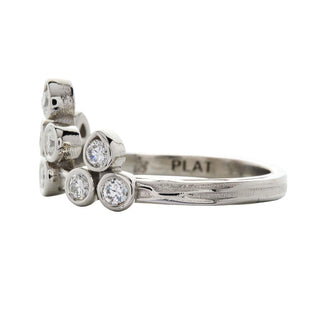 Karen Karch Turned Out Belgian Tiara Ring in Platinum with 10 diamonds in a crown like formation  side view on a white background.